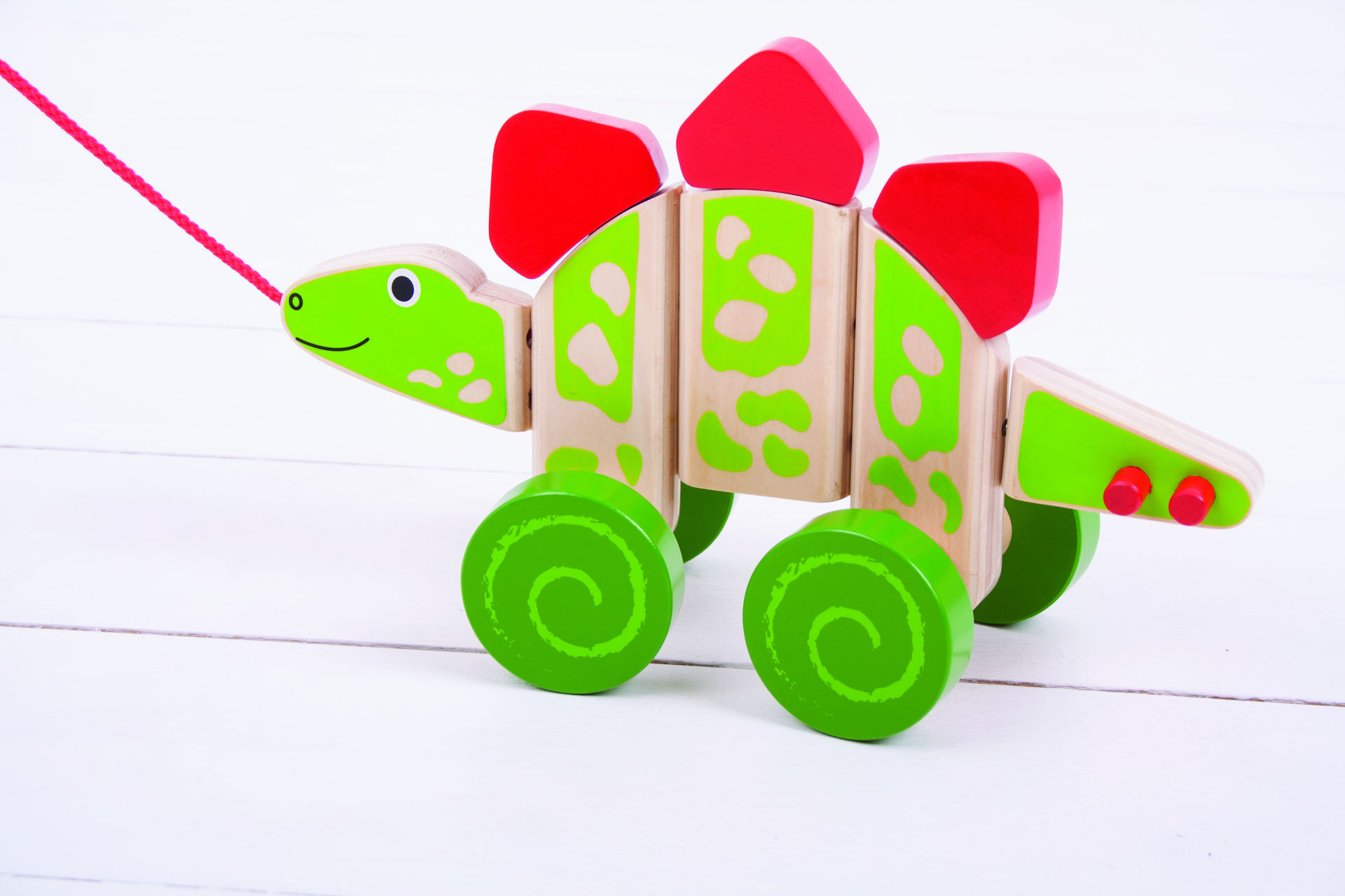 Wooden Stegosaurus Pull Along Wooden Pull Along Dinosaurs BigJigs